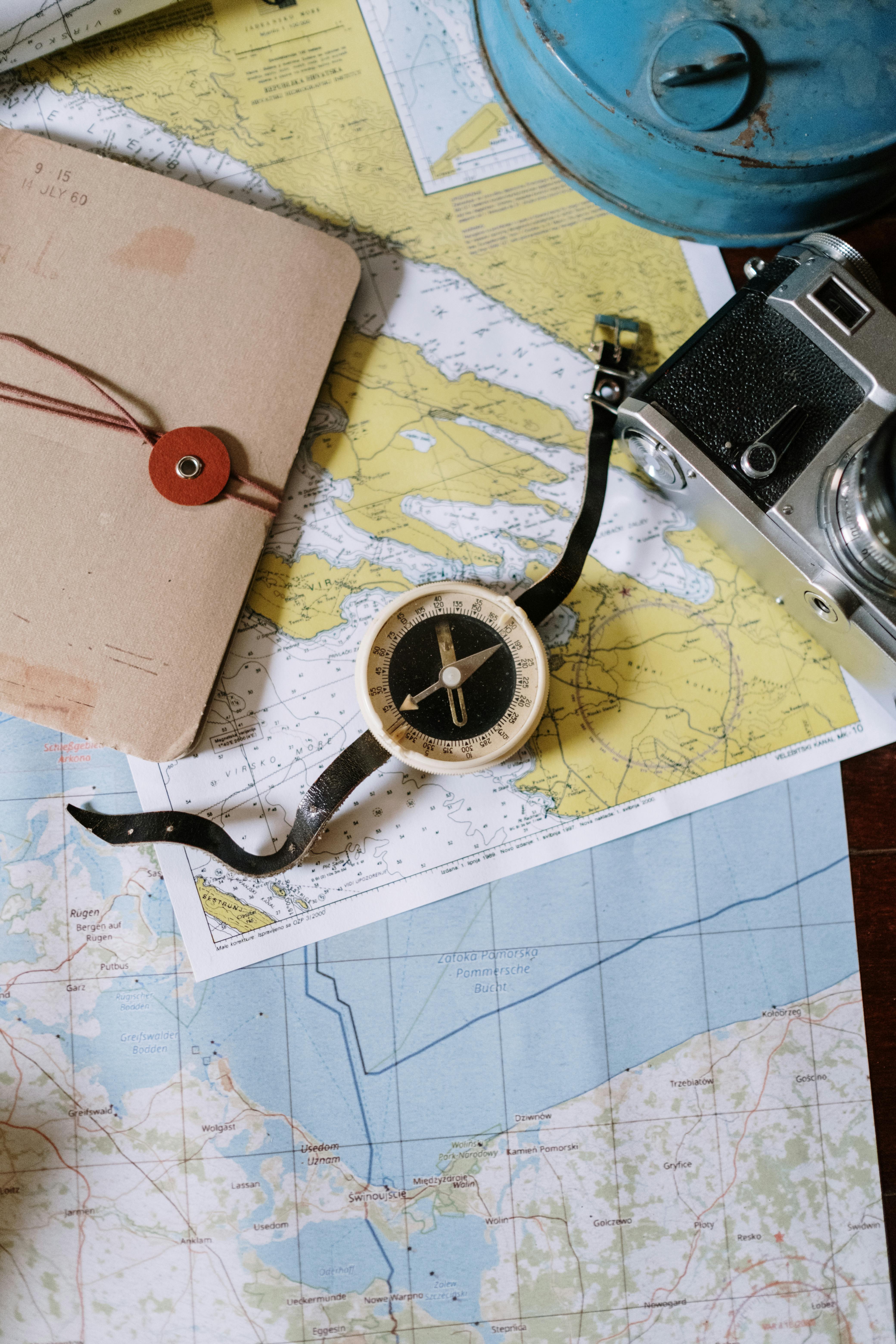 Compass and Map on a Desk